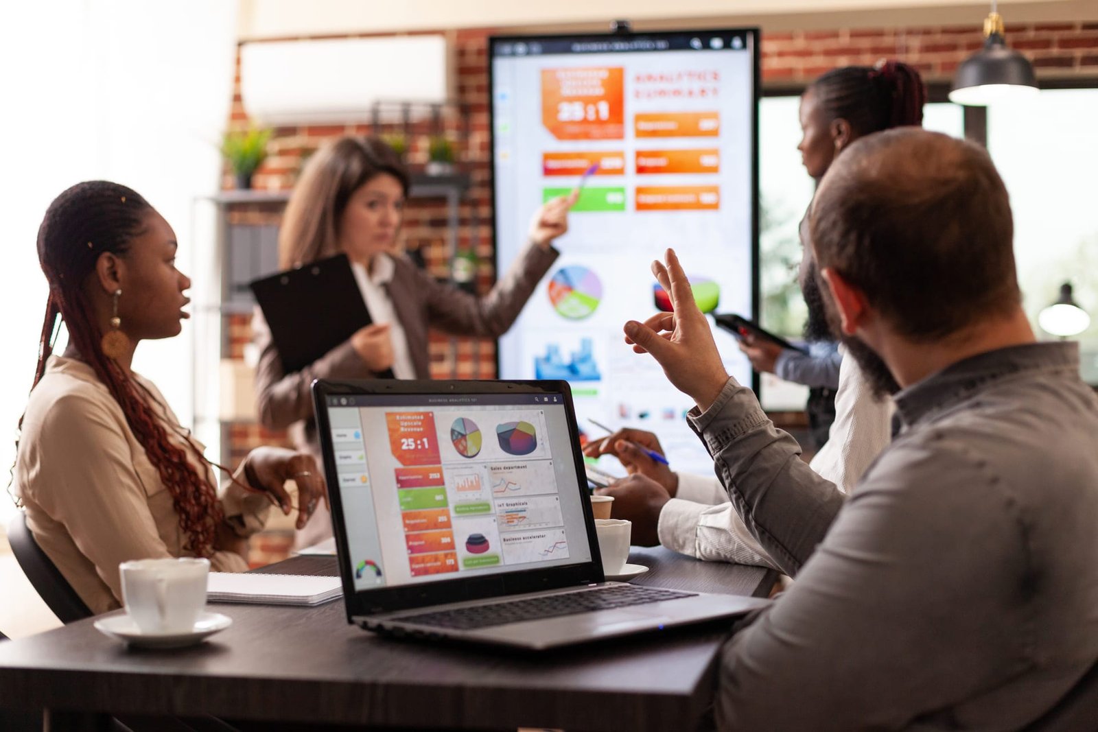 executive-manager-explaining-marketing-strategy-sh-2025-02-19-10-18-24-utc (1) (1)